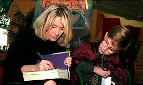 Rowling signing a book